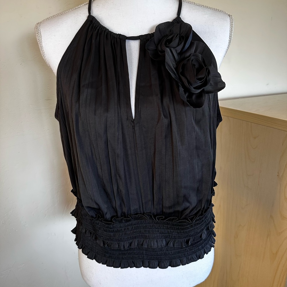 Anthropologie black top with flower